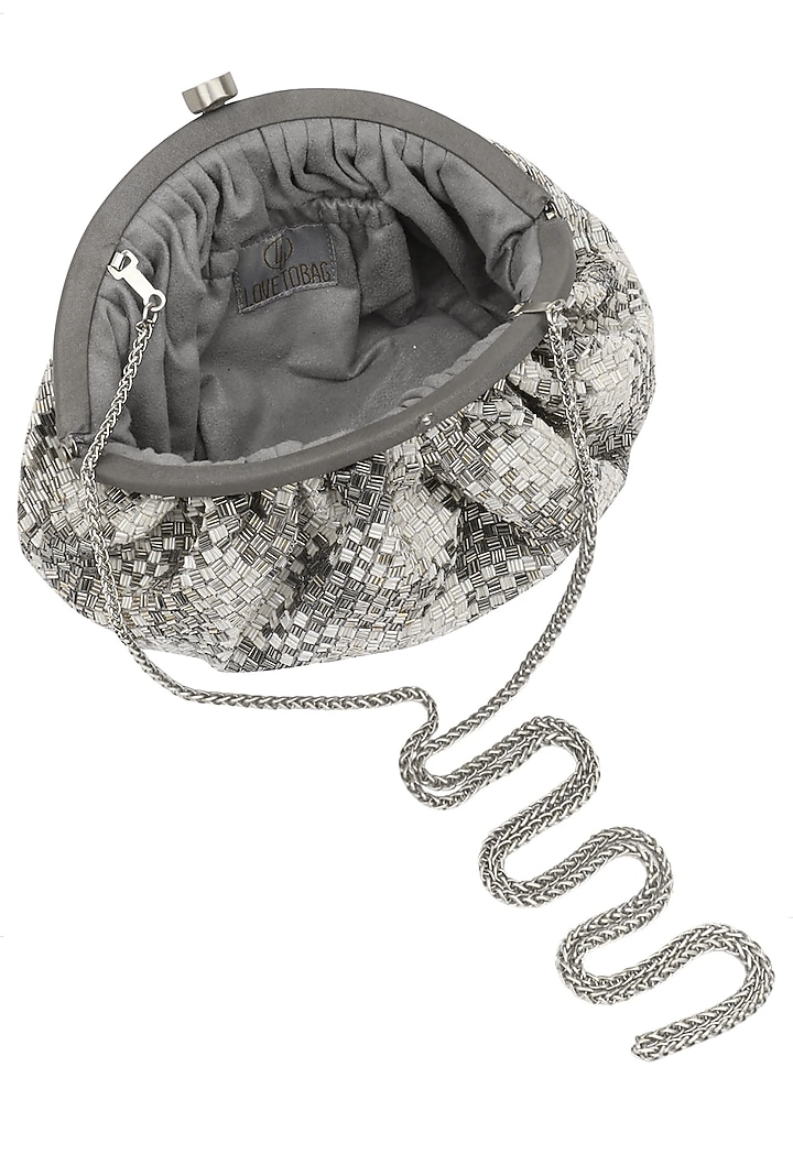Gunmetal, silver and ivory mat design pouchavailable only at Pernia's Pop Up Shop.