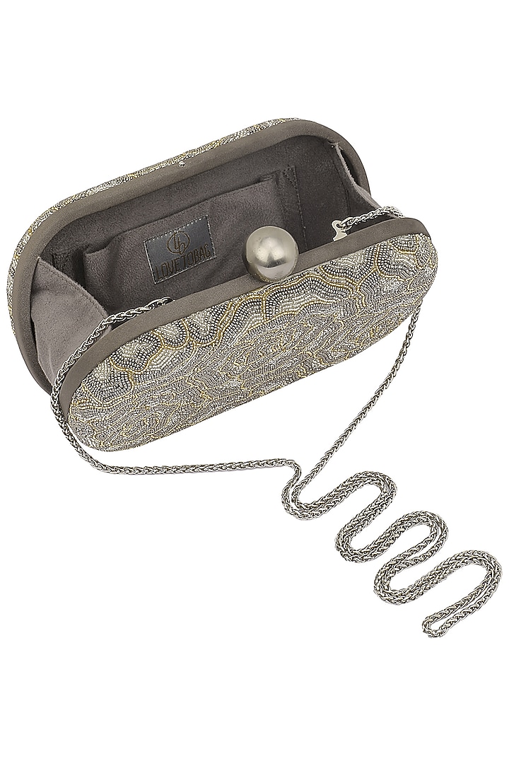 Silver embroidered rosette oval box clutch available only at Pernia's Pop Up Shop.