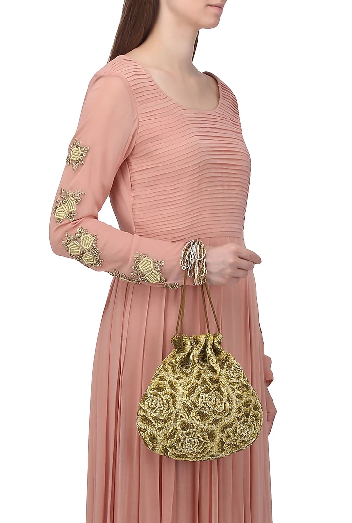 Gold embroidered rosette potli bag available only at Pernia's Pop Up Shop.