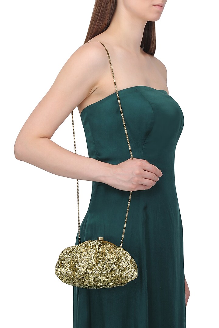 Dark gold embroidered floret pouch available only at Pernia's Pop Up Shop.