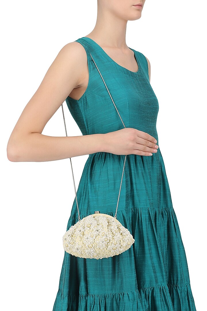 Lovetobag presents Ivory Myoki Clutch available only at Pernia's Pop Up Shop.