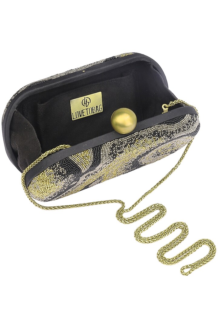 LovetoBag presents Black Gemstone Oval clutch available only at Pernia's Pop Up Shop.