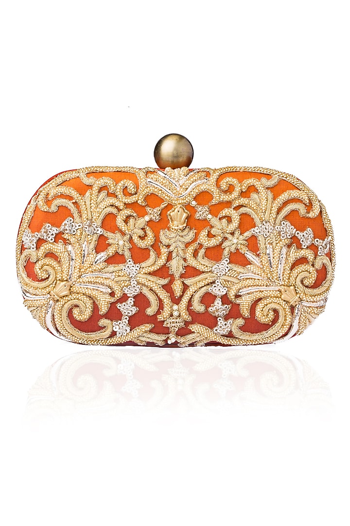 Rust beads and dabka zardosi embroidered oval box clutch available only at Pernia's Pop Up Shop.