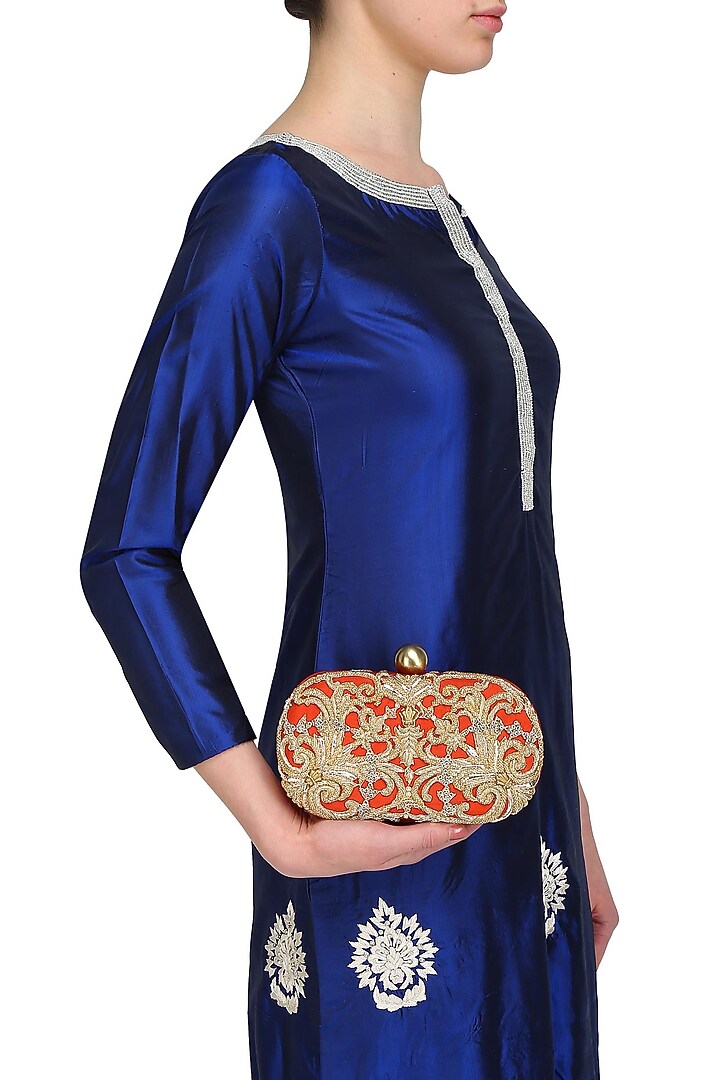 Rust beads and dabka zardosi embroidered oval box clutch available only at Pernia's Pop Up Shop.
