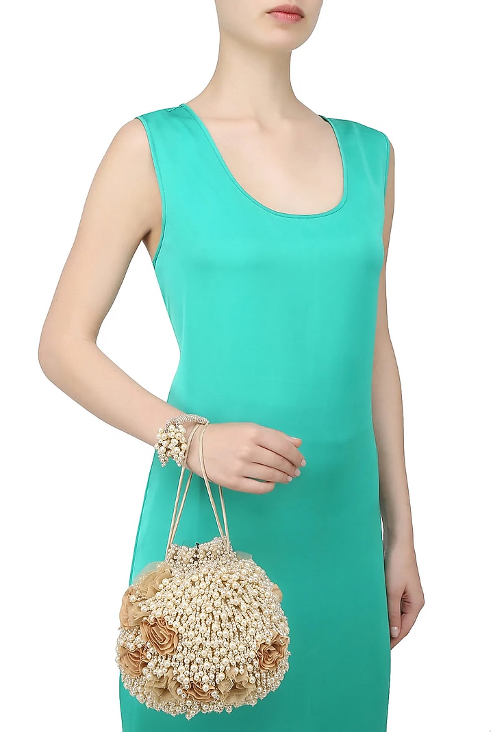 LovetoBag presents Beige pearls and zardosi embroidered rhea bucket pouch available only at Pernia's Pop Up Shop.
