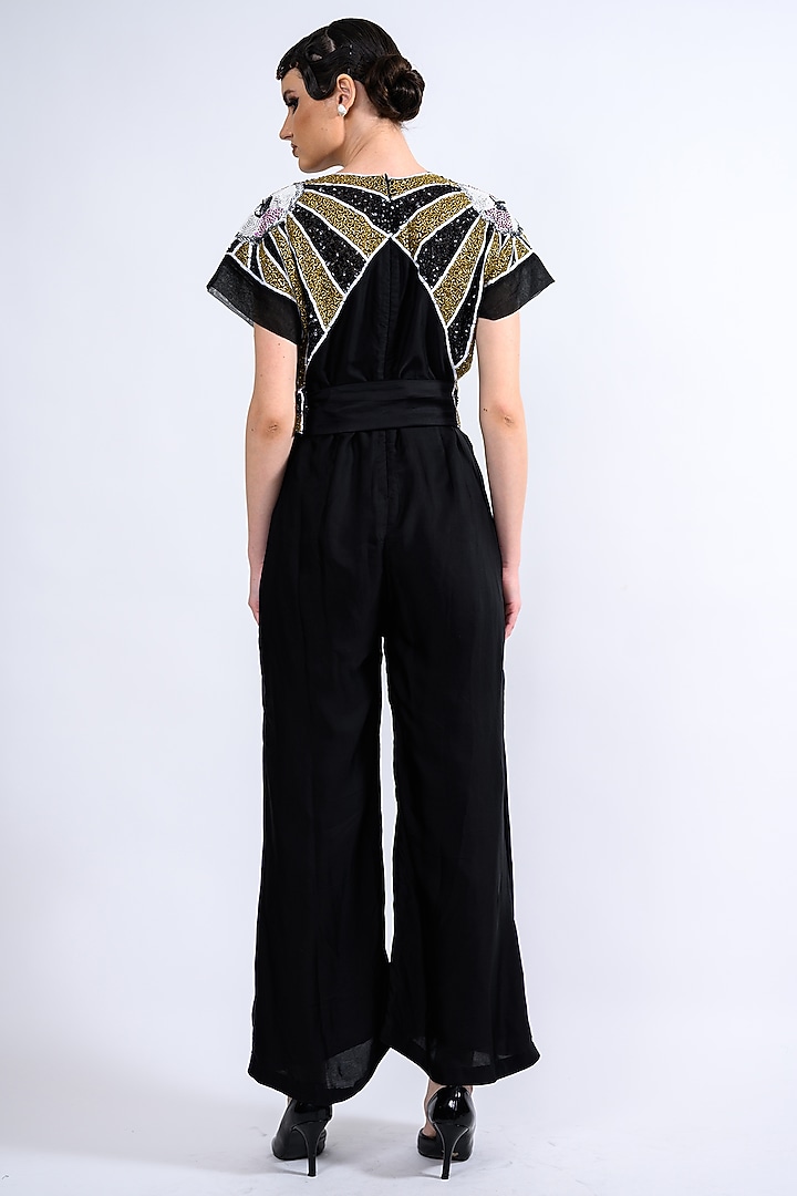 Black Satin Embellished Jumpsuit With Belt by Label Deepshika Agarwal at Pernia's Pop Up Shop