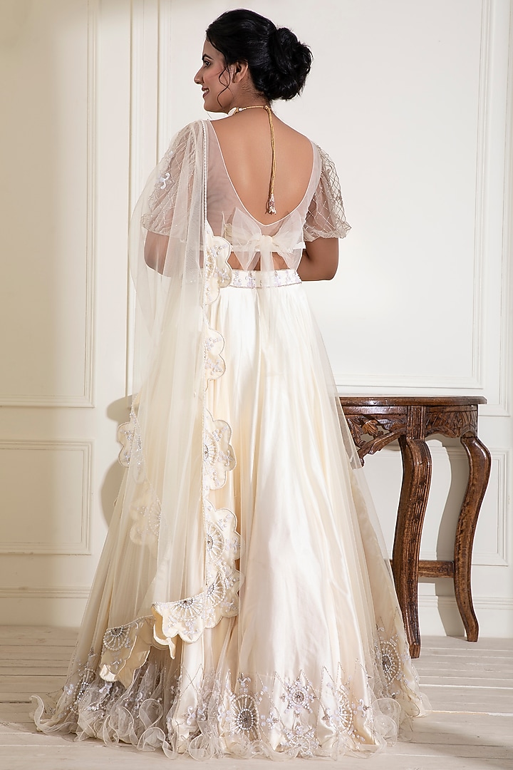 Mellow White Embroidered Wedding Lehenga Set by Label DIVYA JAIN at Pernia's Pop Up Shop