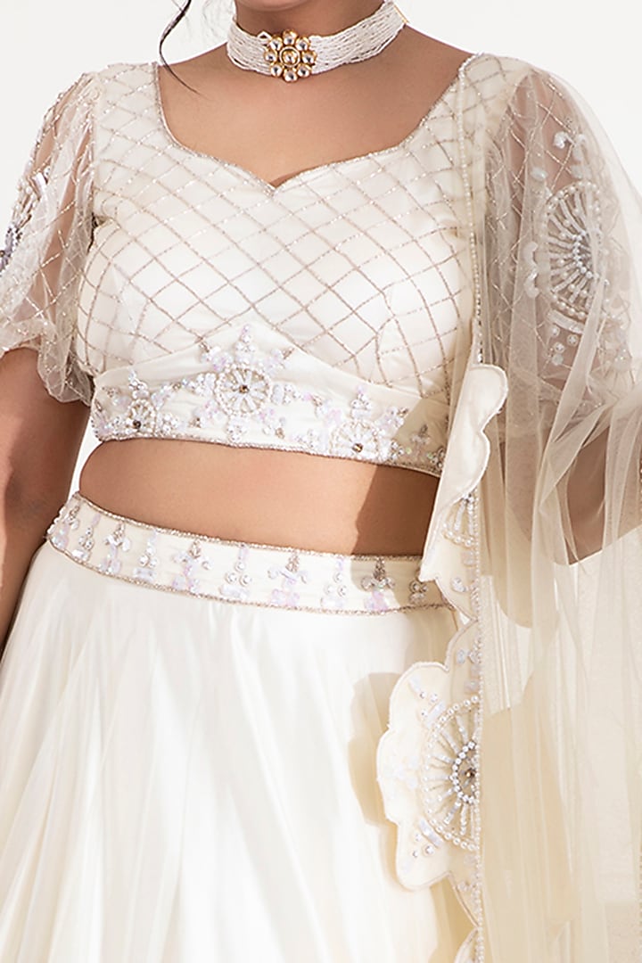 Mellow White Embroidered Wedding Lehenga Set by Label DIVYA JAIN at Pernia's Pop Up Shop