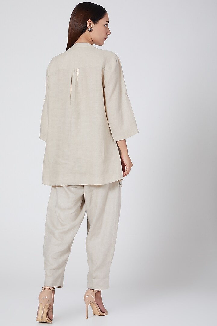 Beige pleated top with hand work by Linen Bloom at Pernia's Pop Up Shop