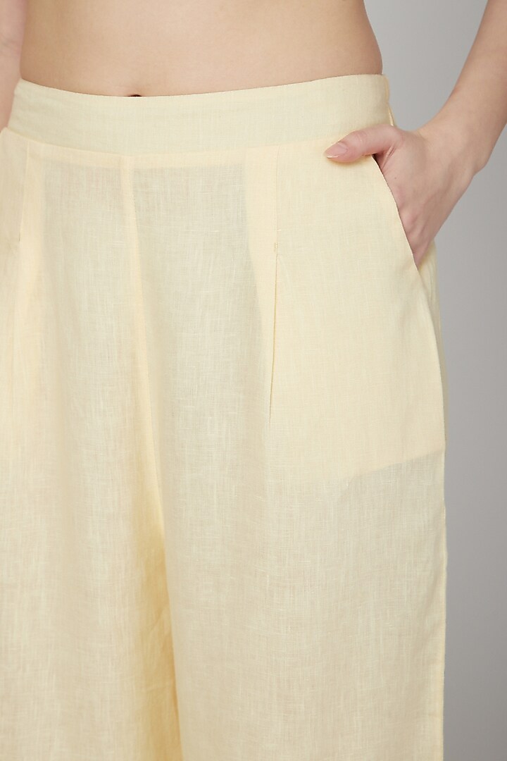 Yellow Linen Flared Pants by Linen Bloom at Pernia's Pop Up Shop