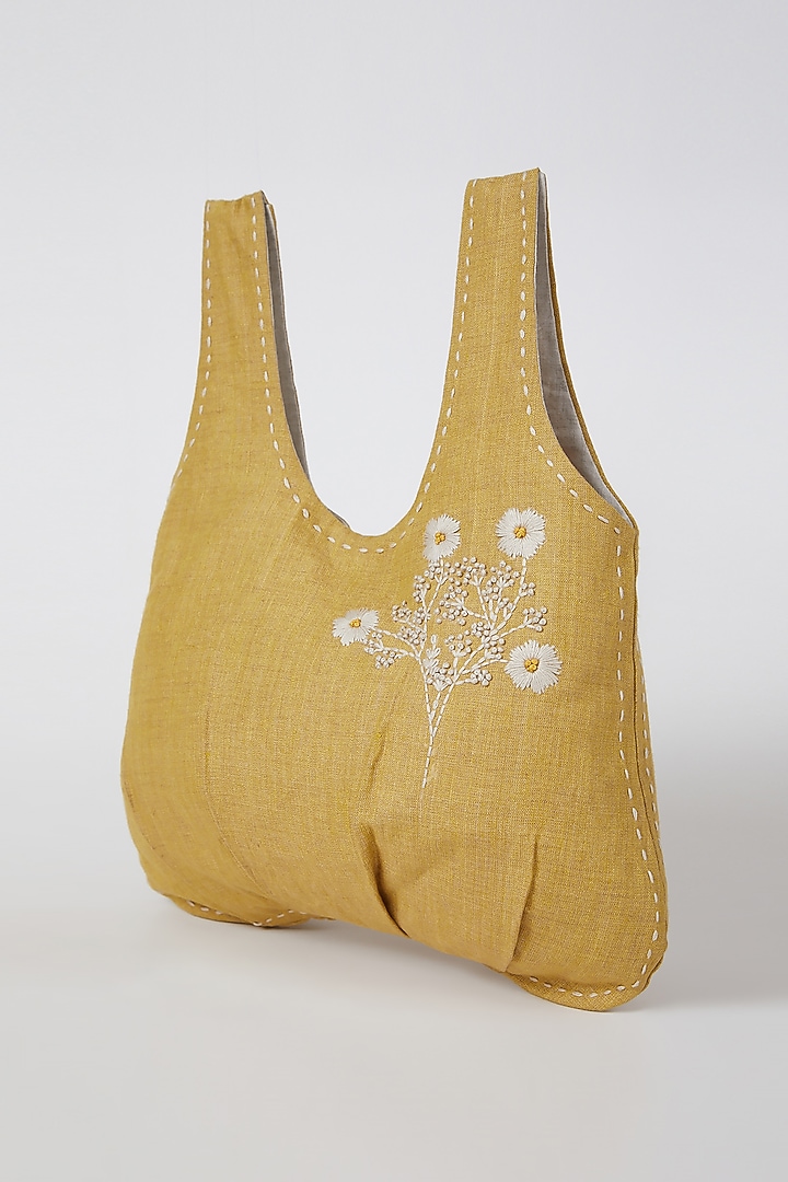 Mustard Embroidered & Pleated Handbag by Linen Bloom at Pernia's Pop Up Shop