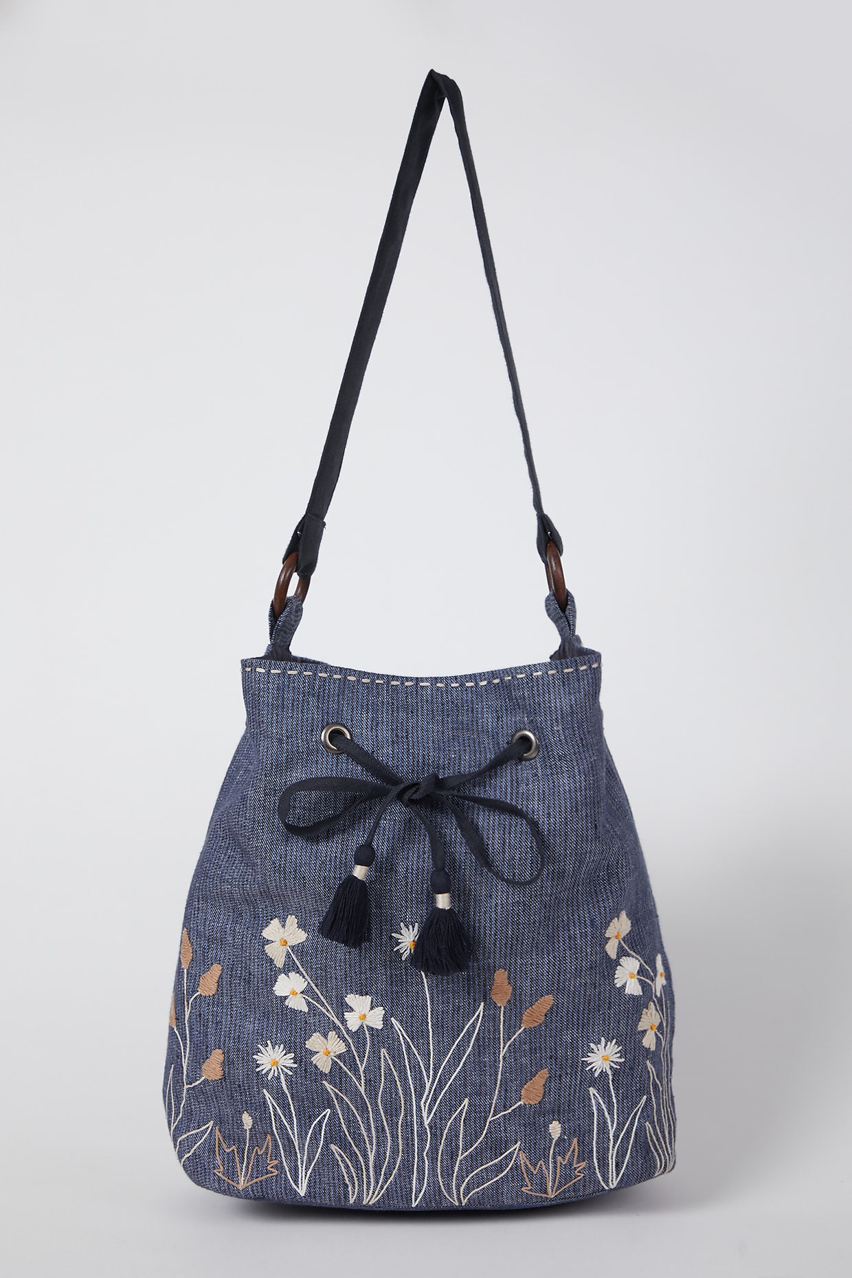 embroidered sling bag