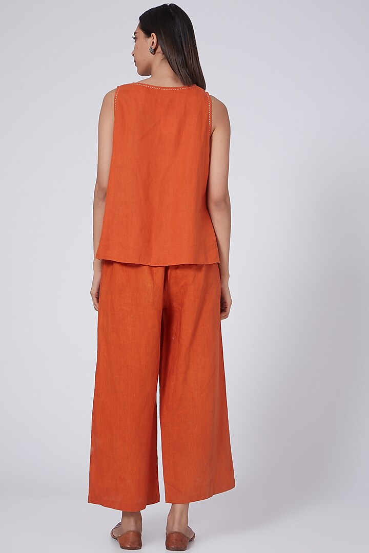 Orange Flared Pants by Linen Bloom at Pernia's Pop Up Shop