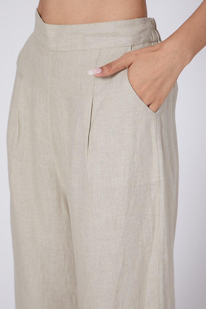 Beige Flared Pants Design by Linen Bloom at Pernia's Pop Up Shop 2024