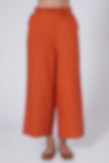 Orange Flared Pants by Linen Bloom at Pernia's Pop Up Shop