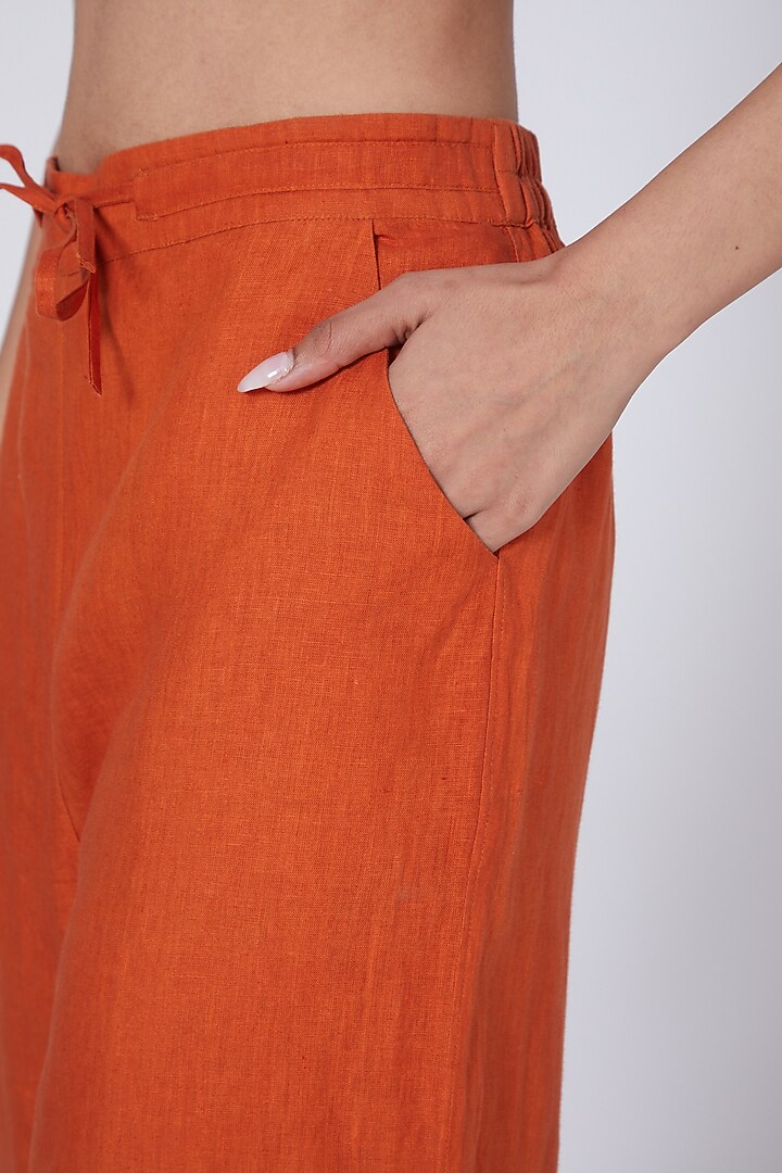 Orange Flared Pants by Linen Bloom at Pernia's Pop Up Shop