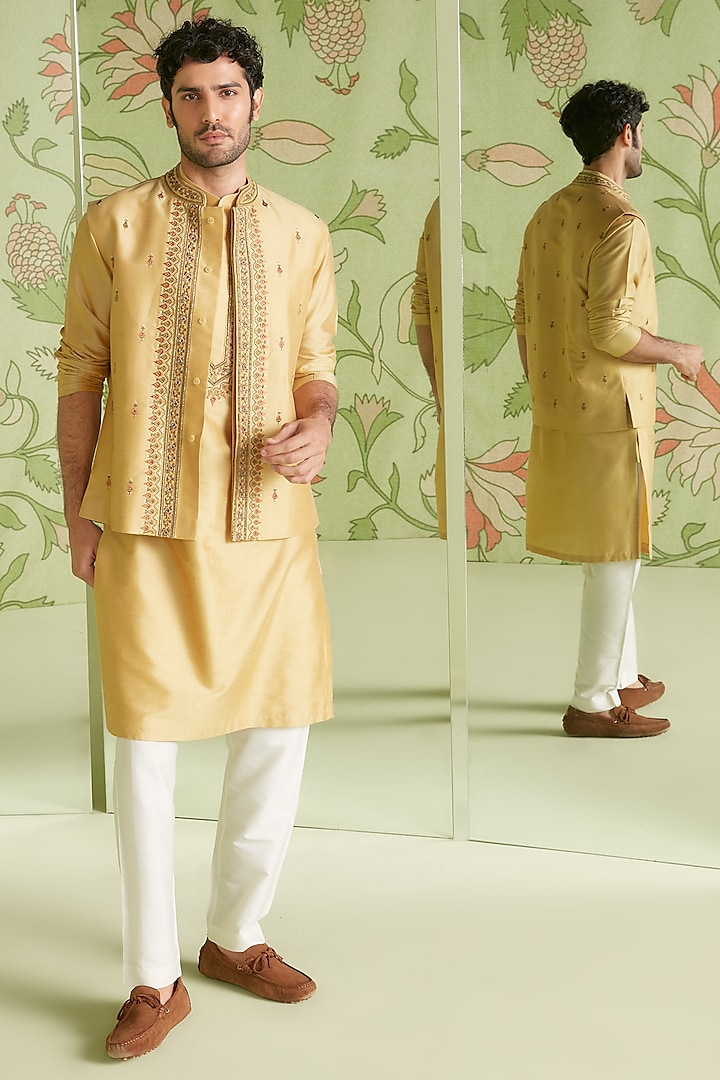 Mustard Cotton Silk Kurta Set With Bundi Jacket by Sanjev Marwaaha Men