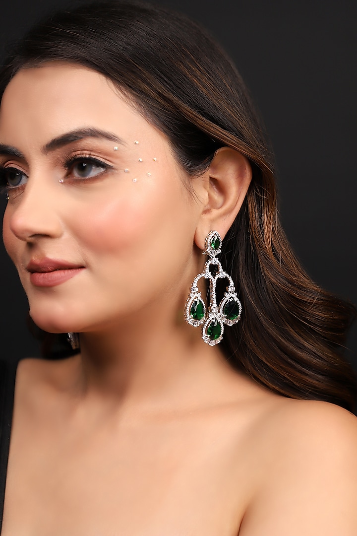 White Finish Zircon & Emerald Stone Dangler Earrings by Lady grace by priyanka