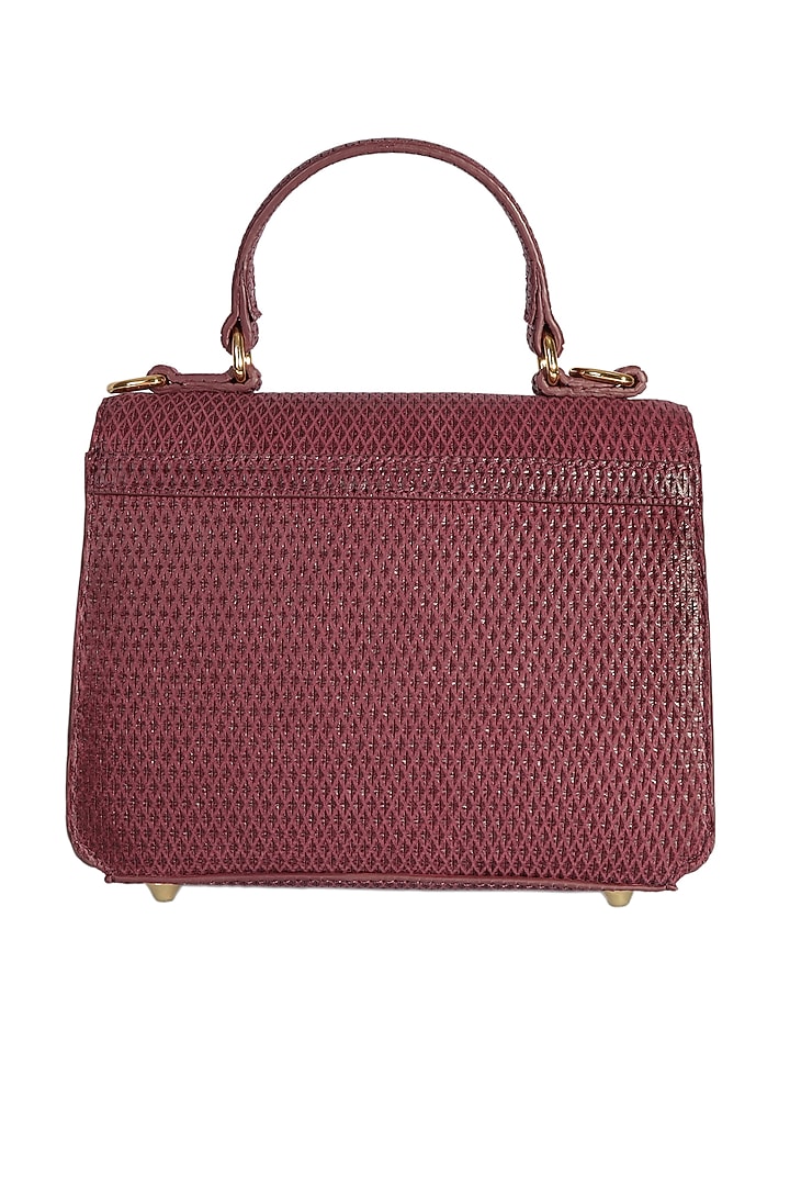 Maroon Cutwork Leather Handbag by The Leather Garden at Pernia's Pop Up Shop