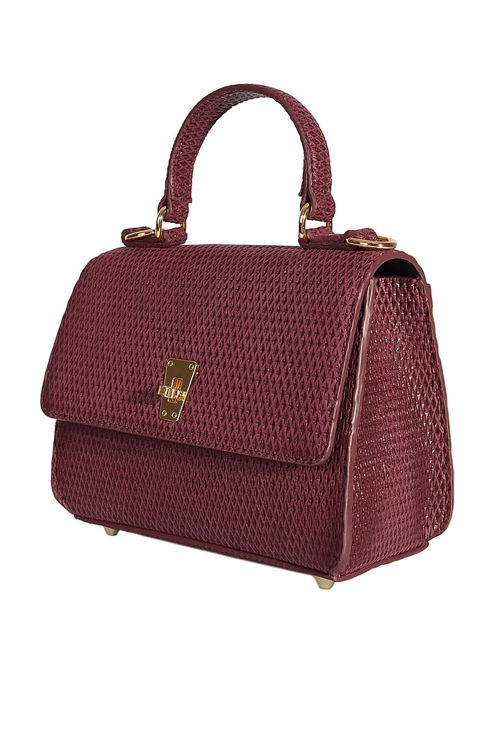 Maroon Cutwork Leather Handbag by The Leather Garden at Pernia's Pop Up Shop