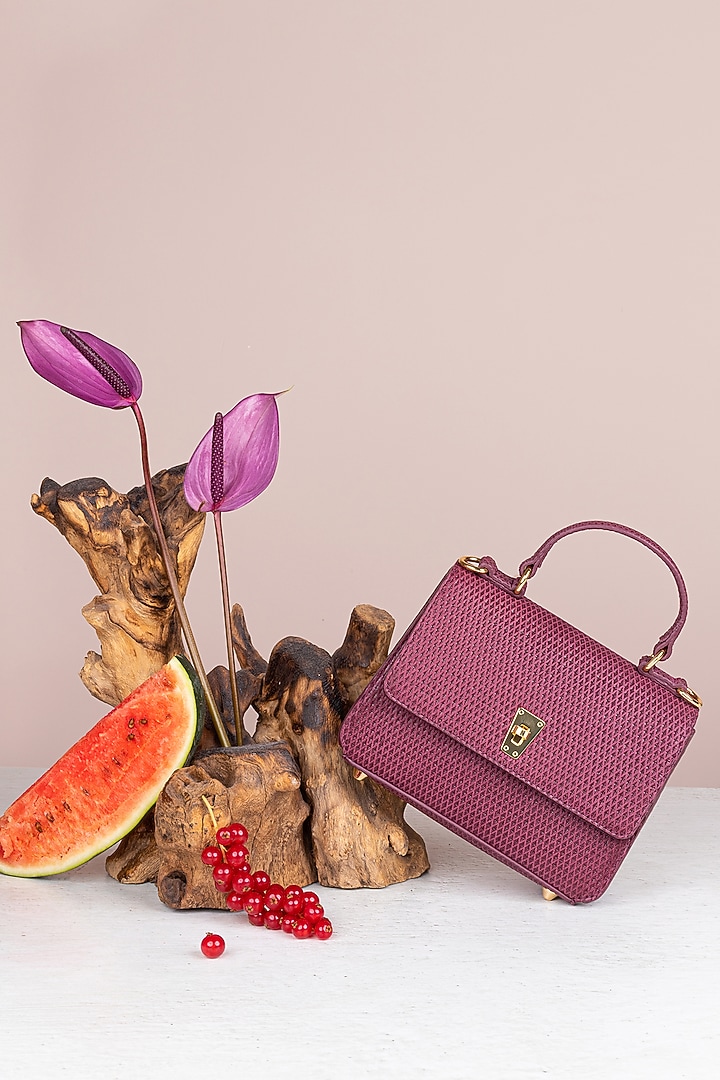 Maroon Cutwork Leather Handbag by The Leather Garden at Pernia's Pop Up Shop