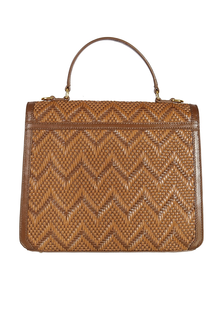 Brown Cutwork Leather Handbag by The Leather Garden at Pernia's Pop Up Shop