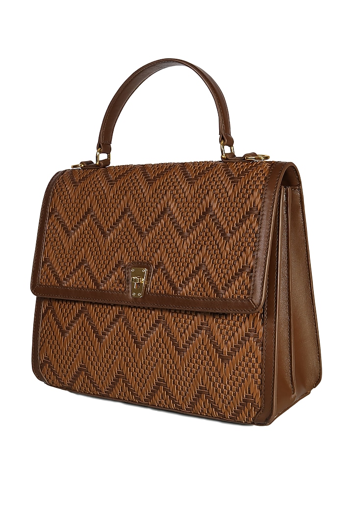 Brown Cutwork Leather Handbag by The Leather Garden at Pernia's Pop Up Shop