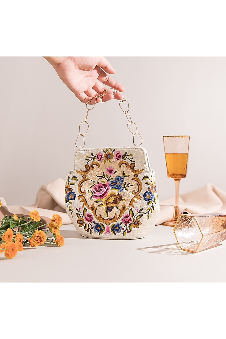 Off White Embroidered Potli Bag by The Leather Garden at Pernia's Pop Up Shop