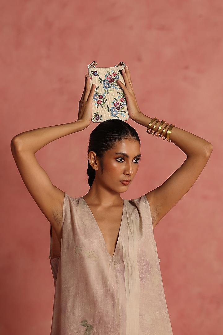 Ivory & Multi-Colored Leather Beadwork Potli Bag by The Leather Garden at Pernia's Pop Up Shop