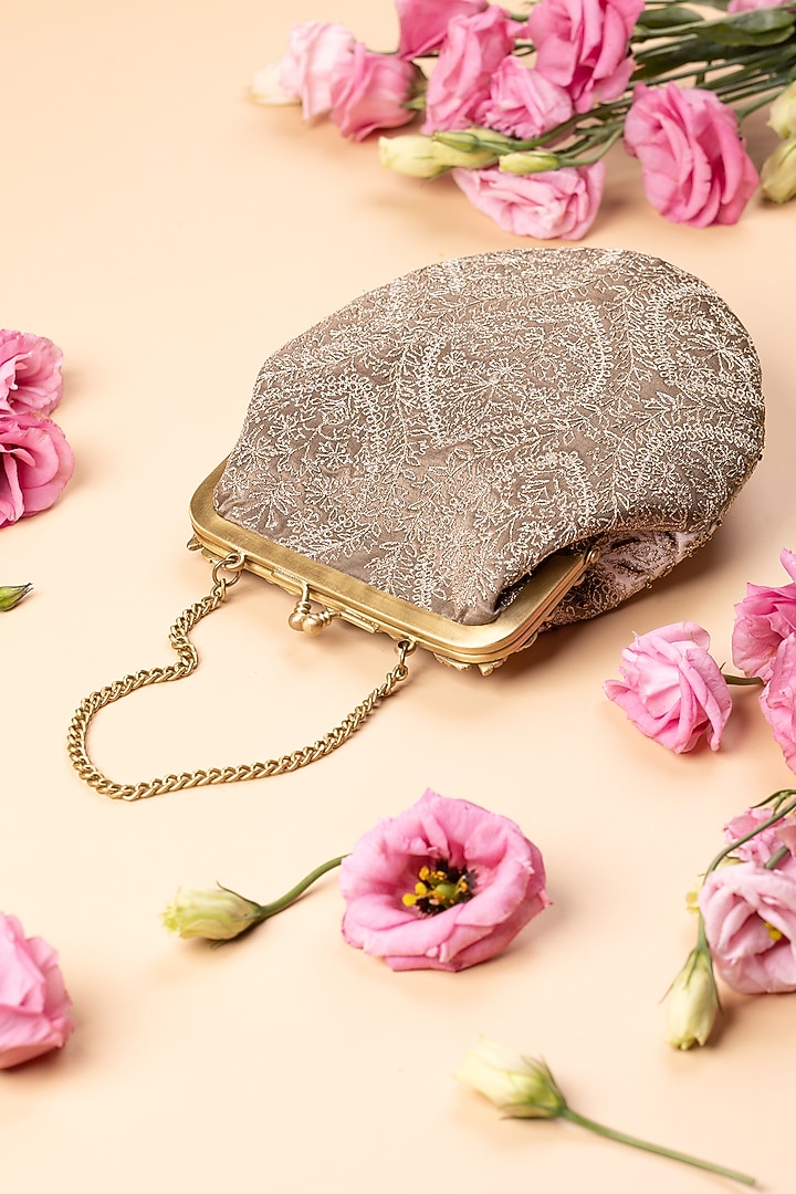 Ivory Satin Embroidered Potli by The Leather Garden at Pernia's Pop Up Shop