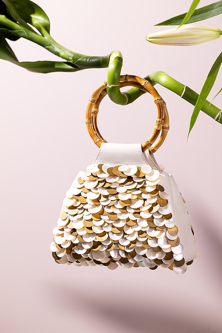 Ivory Leather Embroidered Wristlet Bag by The Leather Garden at Pernia's Pop Up Shop