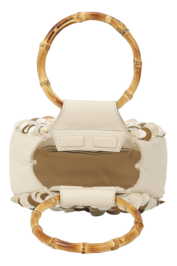 Ivory Leather Embroidered Wristlet Bag by The Leather Garden at Pernia's Pop Up Shop