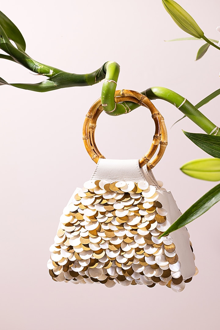 Ivory Leather Embroidered Wristlet Bag by The Leather Garden at Pernia's Pop Up Shop