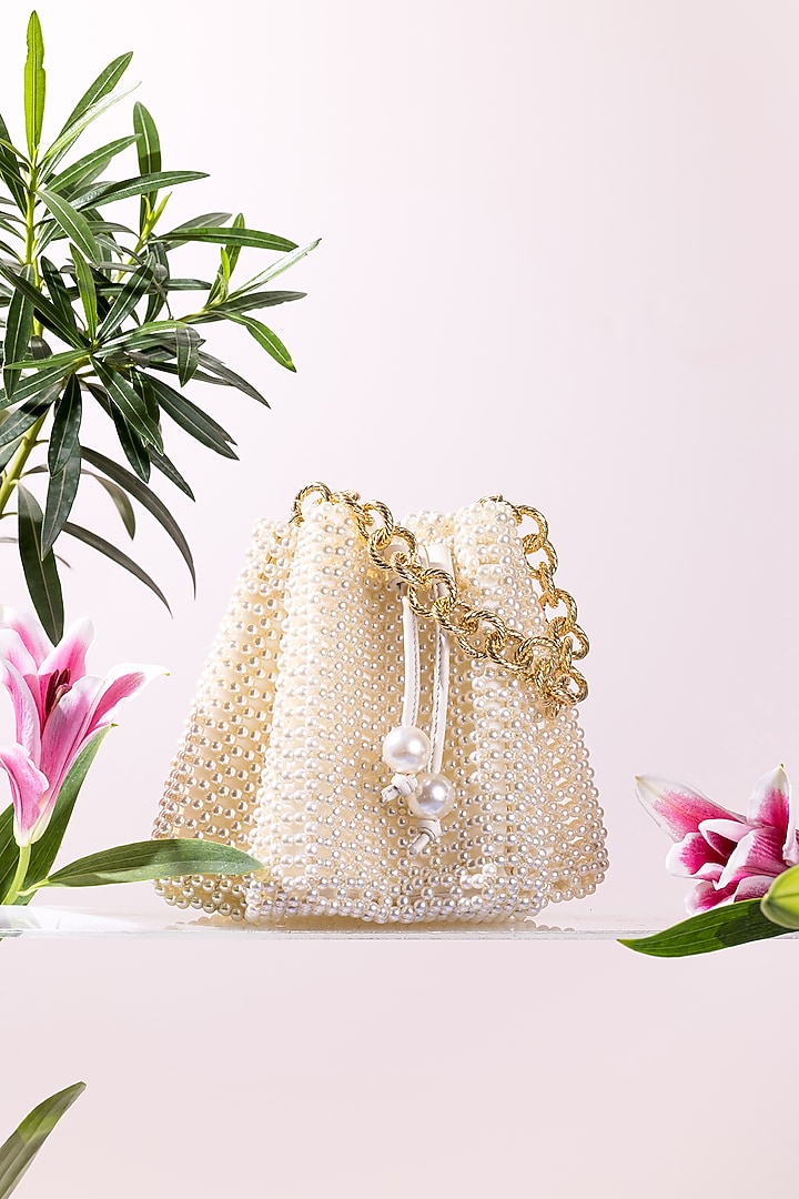 Ivory Beaded & Pearl Wristlet Bag by The Leather Garden at Pernia's Pop Up Shop