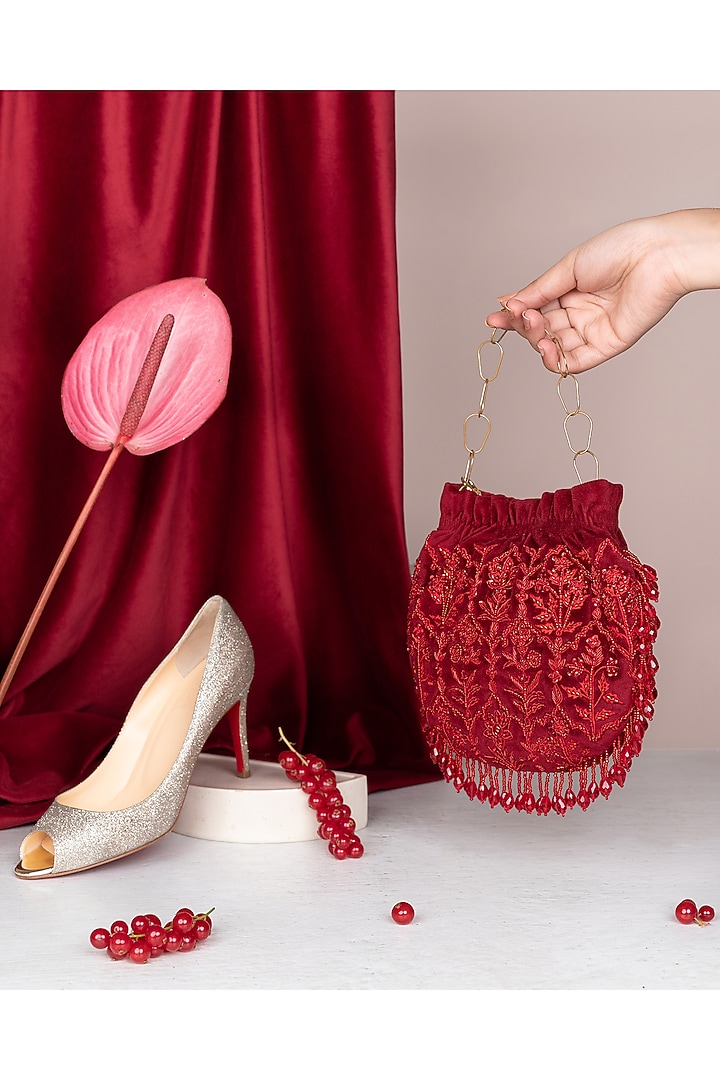 Red Hand Embellished Potli by The Leather Garden at Pernia's Pop Up Shop