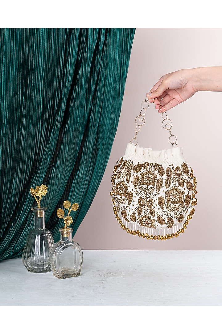 Ivory Hand Embellished Potli by The Leather Garden at Pernia's Pop Up Shop