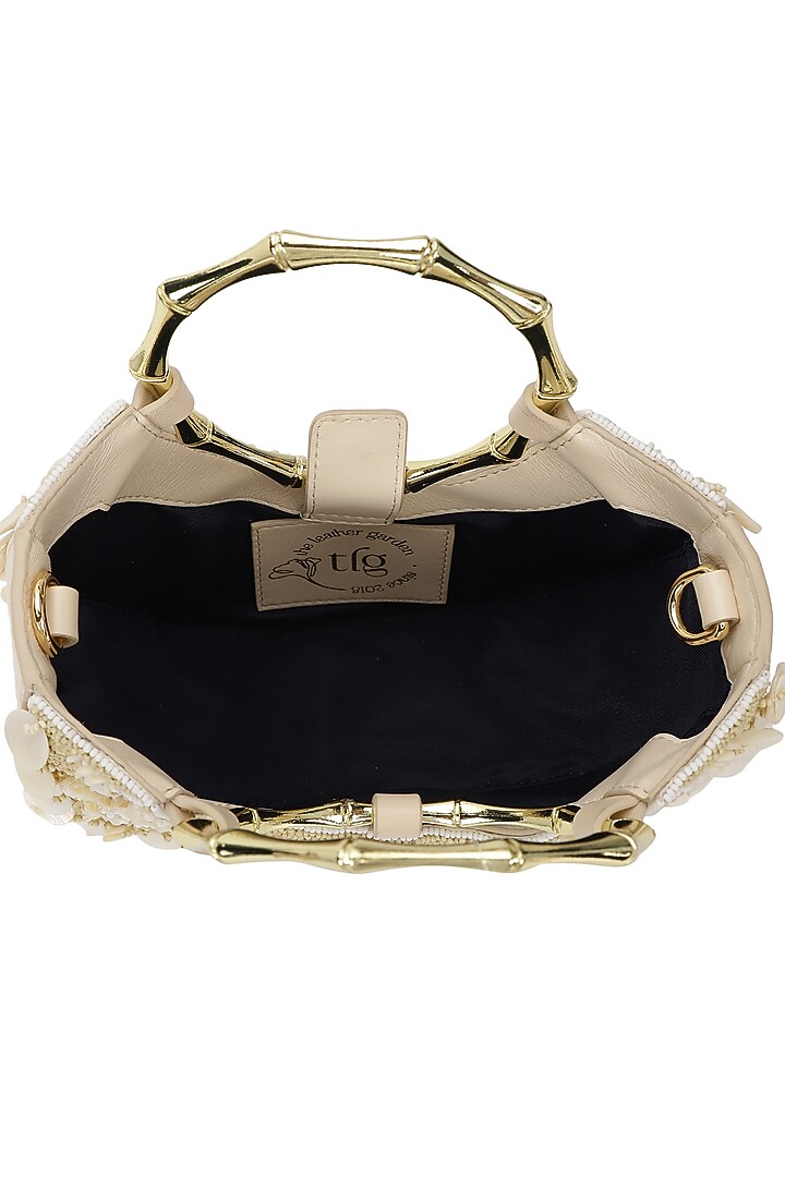 Ivory Leather Beadwork Half-Moon Clutch by The Leather Garden at Pernia's Pop Up Shop