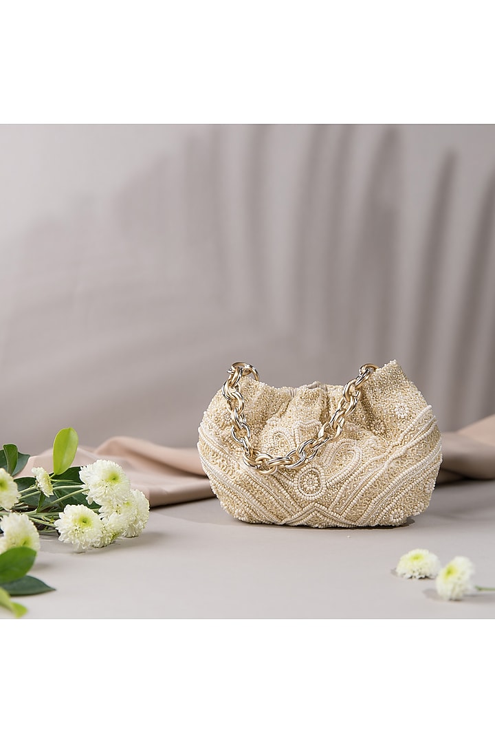 Off White Embroidered Potli Bag by The Leather Garden at Pernia's Pop Up Shop