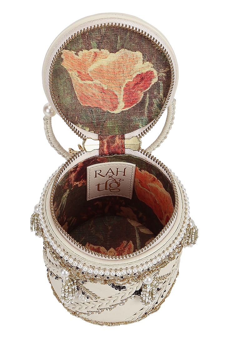 Ivory Leather Floral Embroidered Potli by The Leather Garden at Pernia's Pop Up Shop