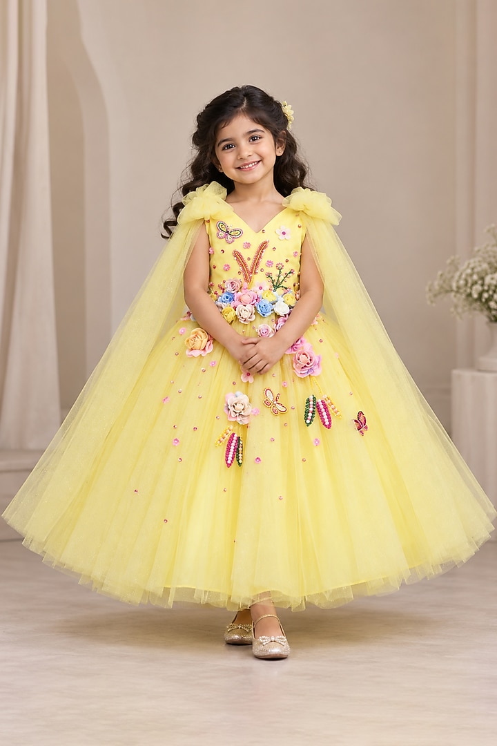 Yellow Net Floral Hand Embellished Gown For Girls by Li & Li Boutique at Pernia's Pop Up Shop