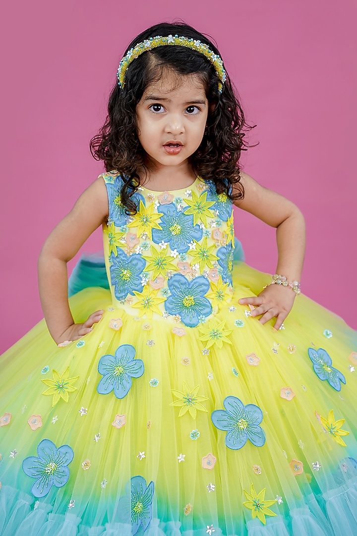 Light Lemon Yellow & Sky Blue Net Floral Embroidered Gown For Girls by Li & Li Boutique at Pernia's Pop Up Shop