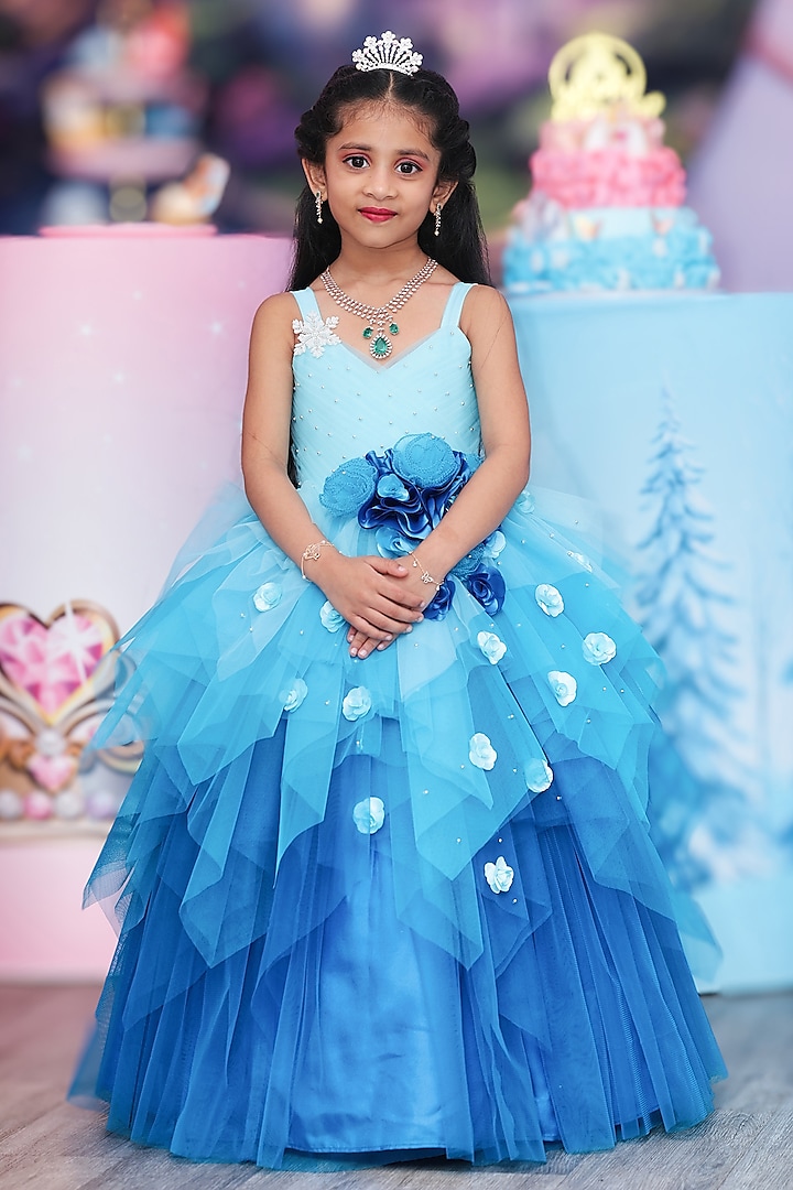 Light Baby Blue Net & Satin Floral Embellished Layered Gown For Girls by Li & Li Boutique at Pernia's Pop Up Shop