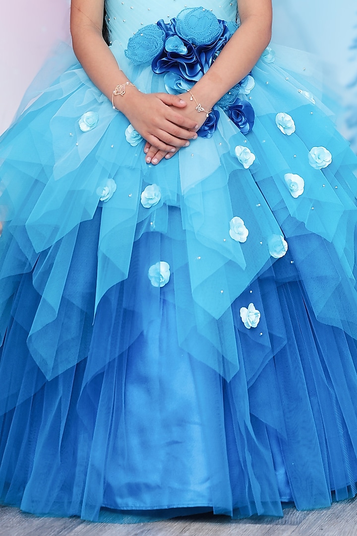Light Baby Blue Net & Satin Floral Embellished Layered Gown For Girls by Li & Li Boutique at Pernia's Pop Up Shop