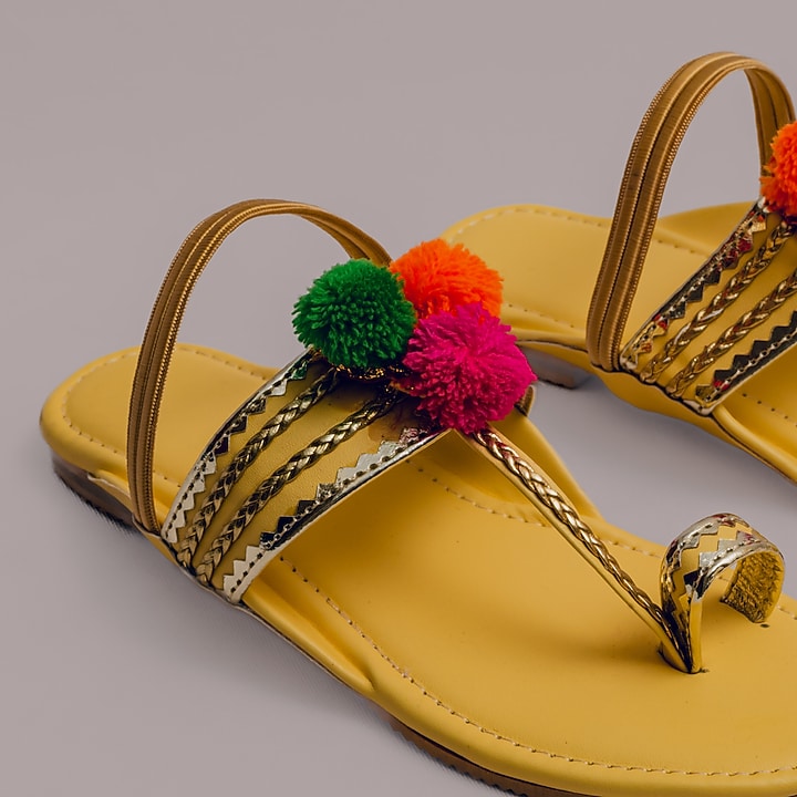 Yellow Synthetic Leather Embellished Kolhapuris For Girls  by LIL PITAARA at Pernia's Pop Up Shop