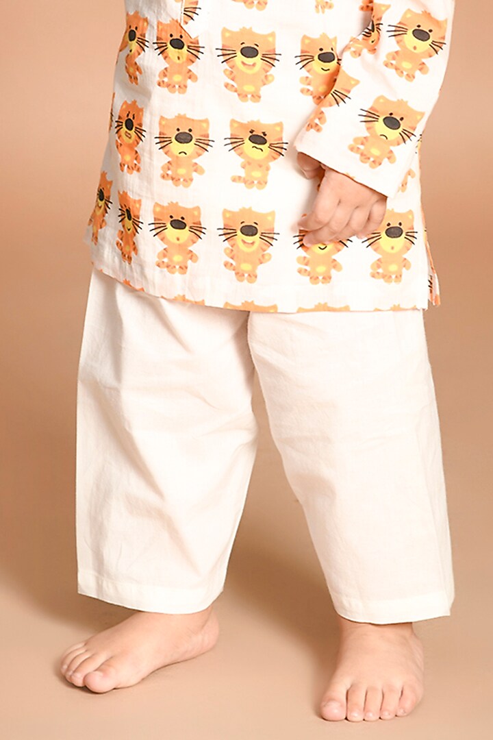 Orange Printed Kurta Set by LIL PITAARA at Pernia's Pop Up Shop