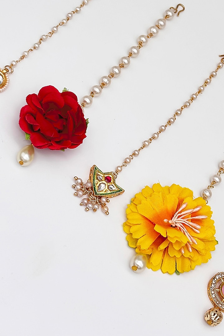 Multi-Colored Faux Floral & Pearl Mangtikkas For Girls (Set Of 5) by Lime by Manika at Pernia's Pop Up Shop