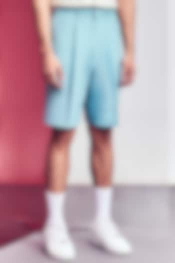 Light Blue Pleated Postman Shorts by Line Outline at Pernia's Pop Up Shop