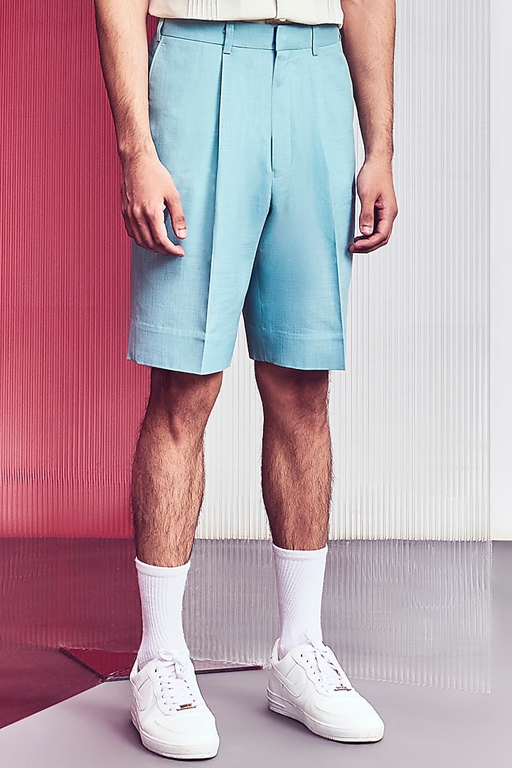 Light Blue Pleated Postman Shorts by Line Outline at Pernia's Pop Up Shop