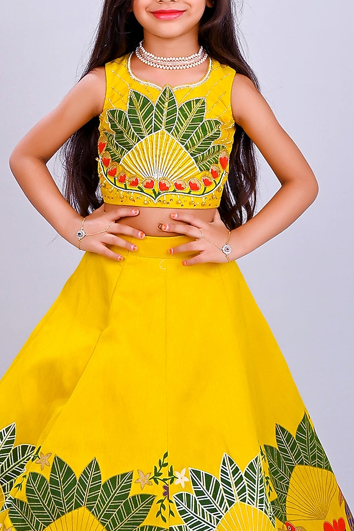 Yellow Raw Silk Printed & Embroidered Lehenga Set For Girls by Lakshmi Reddy at Pernia's Pop Up Shop