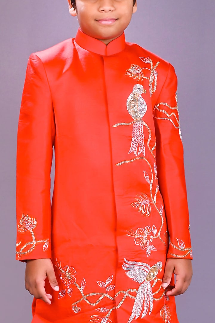 Red Satin Raw Silk Motifs Sherwani Set For boys by Lakshmi Reddy at Pernia's Pop Up Shop